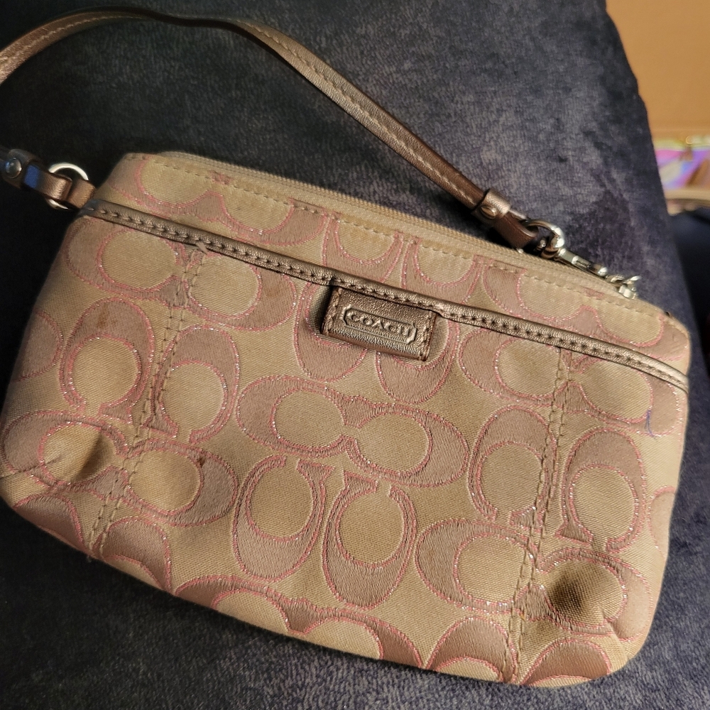 Pink and tan coach wristlet